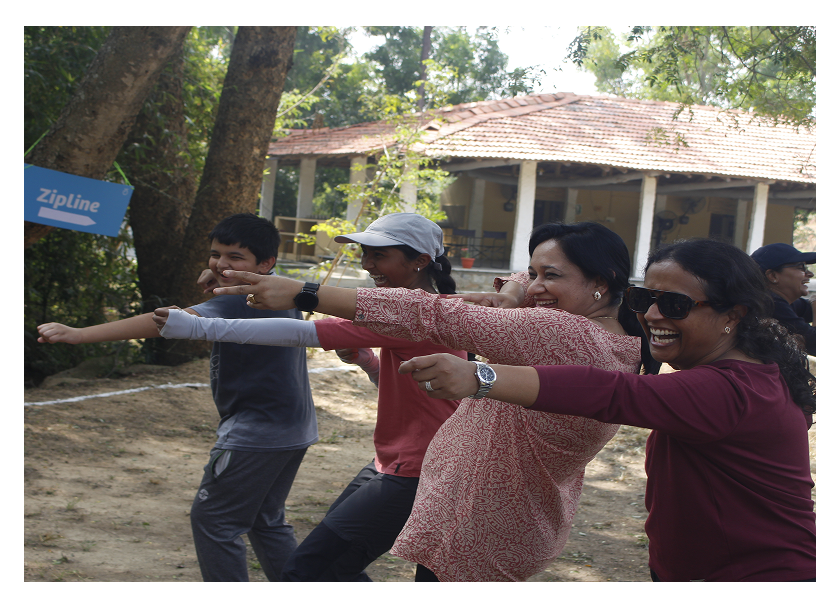 Family enjoying outdoor activities at an INME family weekend